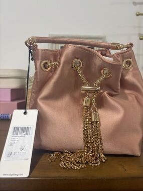 Olga Berg Satin Drawstring Mini Bag in Rose Gold